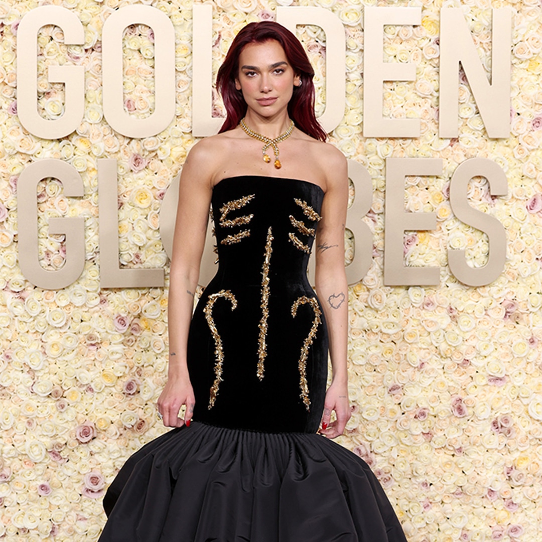 Dua Lipa Struggles to Sit in Her Viral Bone Dress at the Golden Globes